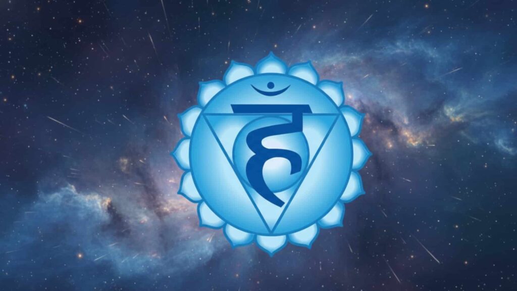 A glowing blue Vishuddha (throat) chakra symbol set against a dark cosmic background filled with stars and a soft nebula.