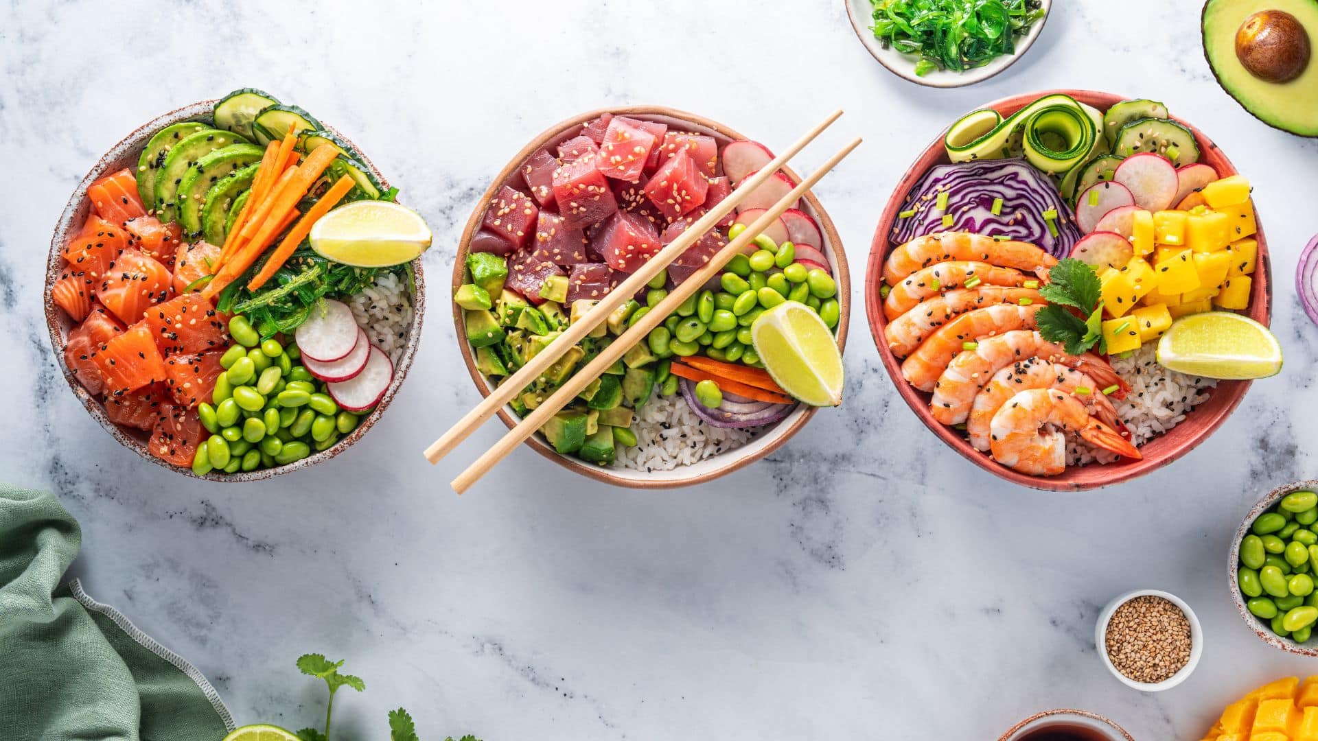 Colorful poke bowls with salmon, tuna, shrimp, rice, avocado, and veggies showing calorie differences in popular poke bowl combinations.