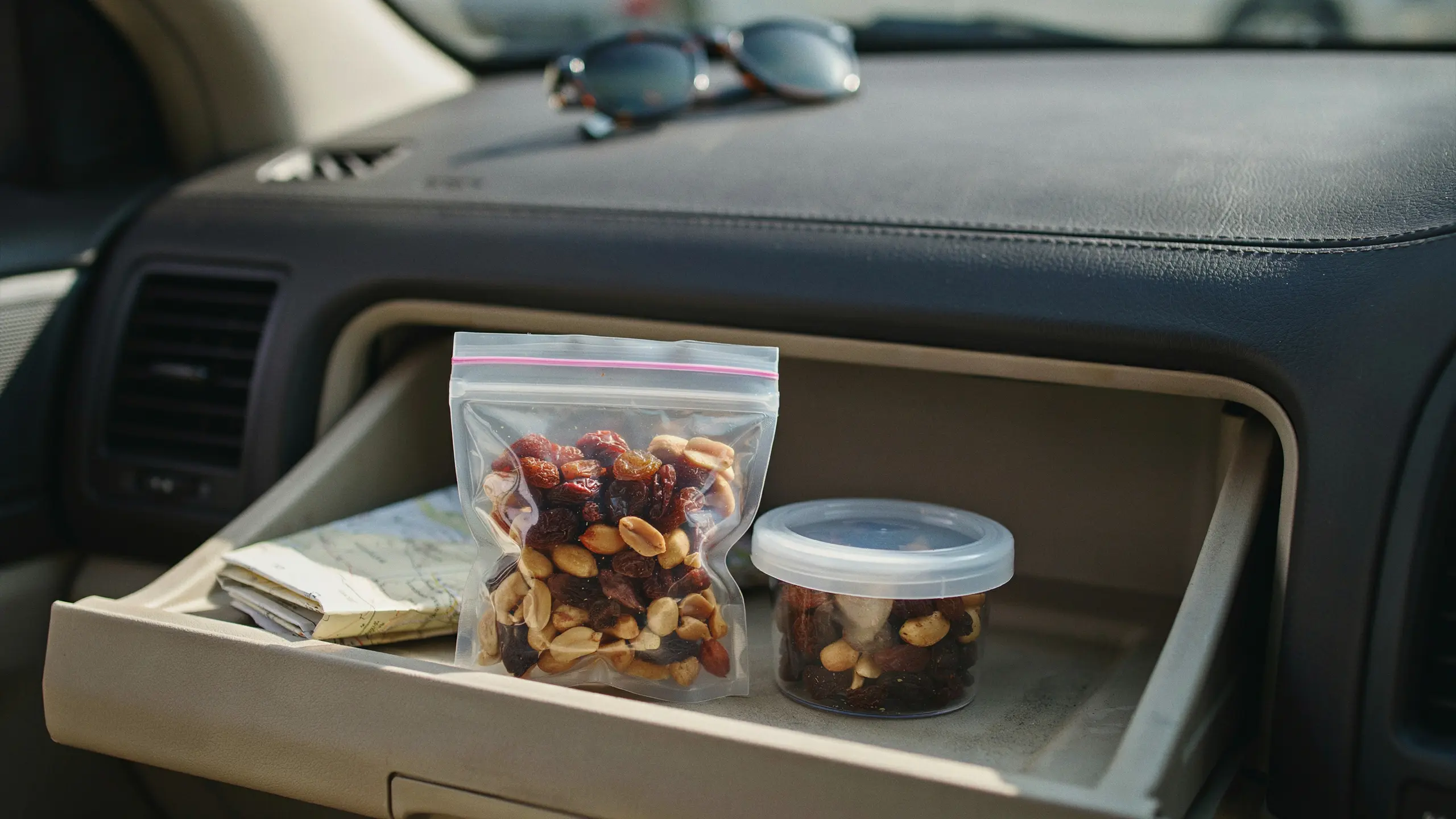 Simple GORP mix with raisins and peanuts packed for a road trip snack.
